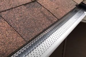 Aluminum Gutter Guards by West Michigan Roof and Gutter